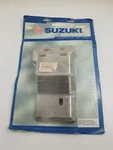 Suzuki 99950-70408, Swing Arm Skid Plate. Nos. Fast Shipping!!!. Fixed Price $54.68.