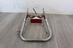 1986 Suzuki LT230S Quadsport Rear Grab Bar With Tail Light 43980-22A00. Fixed Price $45.00.